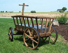 http://amishshop.com/hazel-doc/imageamish2007/goatwagongldbrwnbck.jpg (198412 bytes)