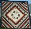 http://amishshop.com/hazel-doc/imageamish2008/quiltheartsaroundcrose.jpg (227074 bytes)