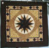 http://amishshop.com/hazel-doc/imageamish2008/wallquiltmarinerscompassbrn.jpg (170342 bytes)